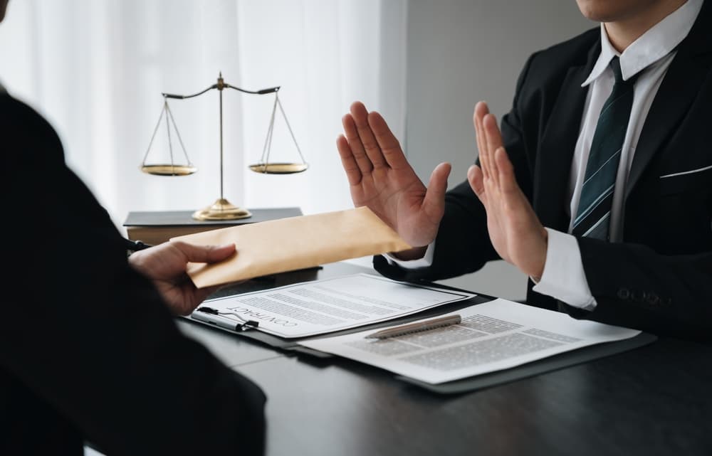 A man is rejecting the financial settlement offer from an insurance company following an accident.